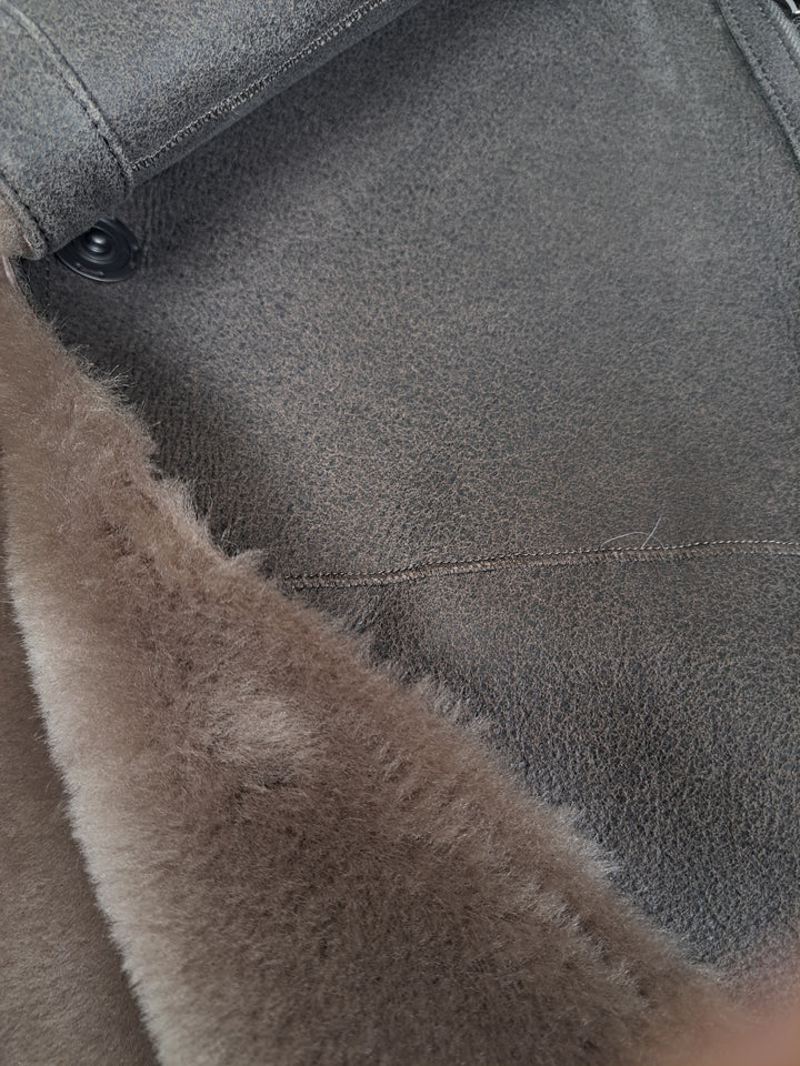 Close-up of Giorgiana 95 cm brown reversible Nappa lamb coat with button detail and fur trim