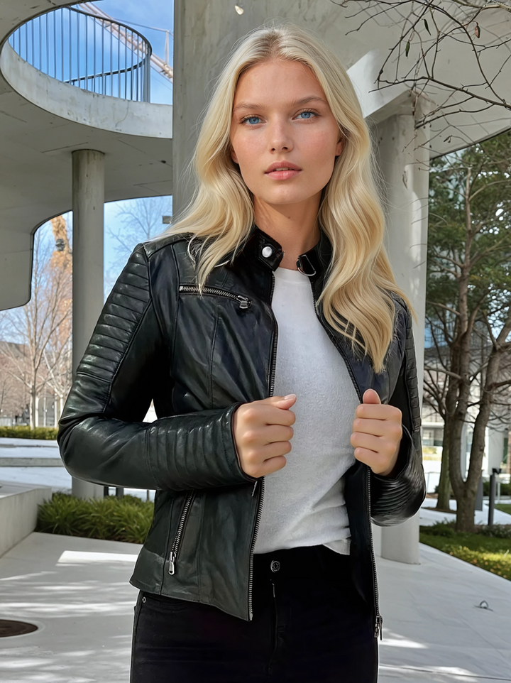 Model wearing the Scooty black lambskin biker jacket, front view with quilted shoulders and sleeves